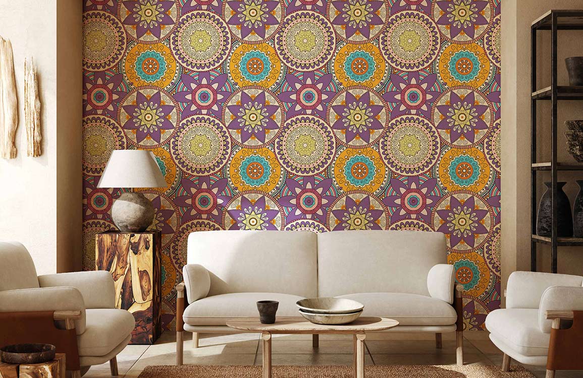 Vibrant mandala wallpaper in lounge with beige sofas, wooden table, earthy Décor, and bohemian flair.