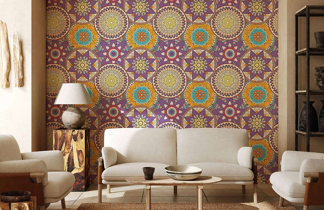 Vibrant mandala wallpaper in lounge with beige sofas, wooden table, earthy Décor, and bohemian flair.