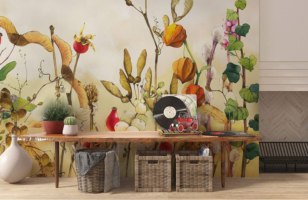 Vintage Autumn Floral Watercolour Mural Wallpaper in warm earthy tones behind wooden table in living room.