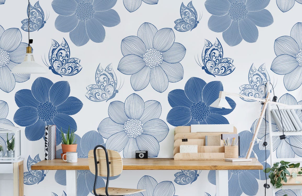 Elegant blue floral butterfly wallpaper, wooden desk, white lamp, stylish home office Décor, modern interior.