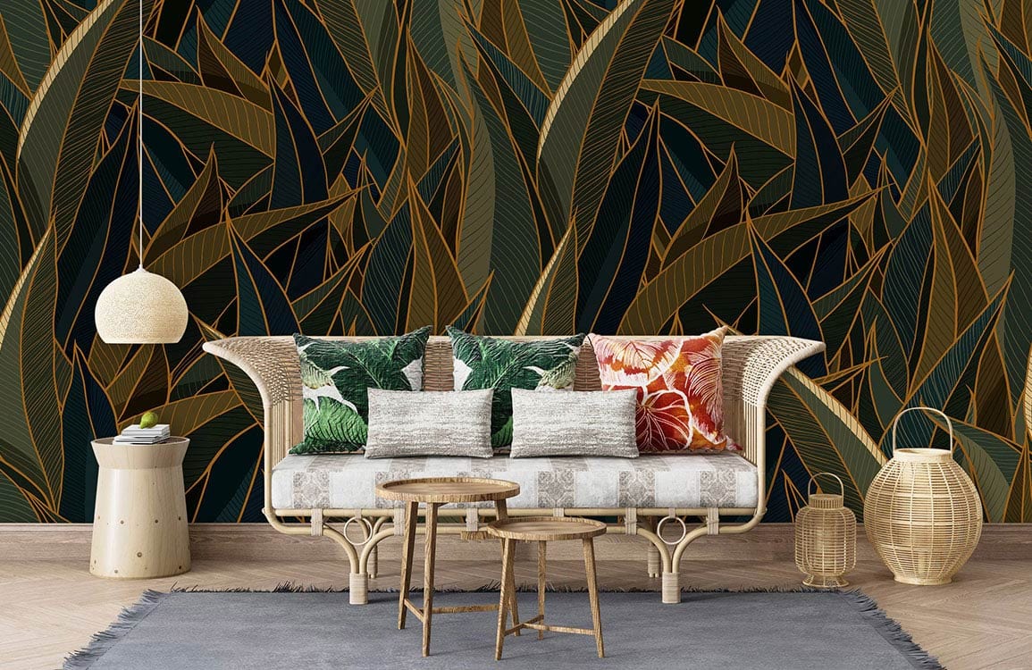 Art Deco teal and gold jungle leaf wallpaper, rattan sofa, natural flooring, living room setting.