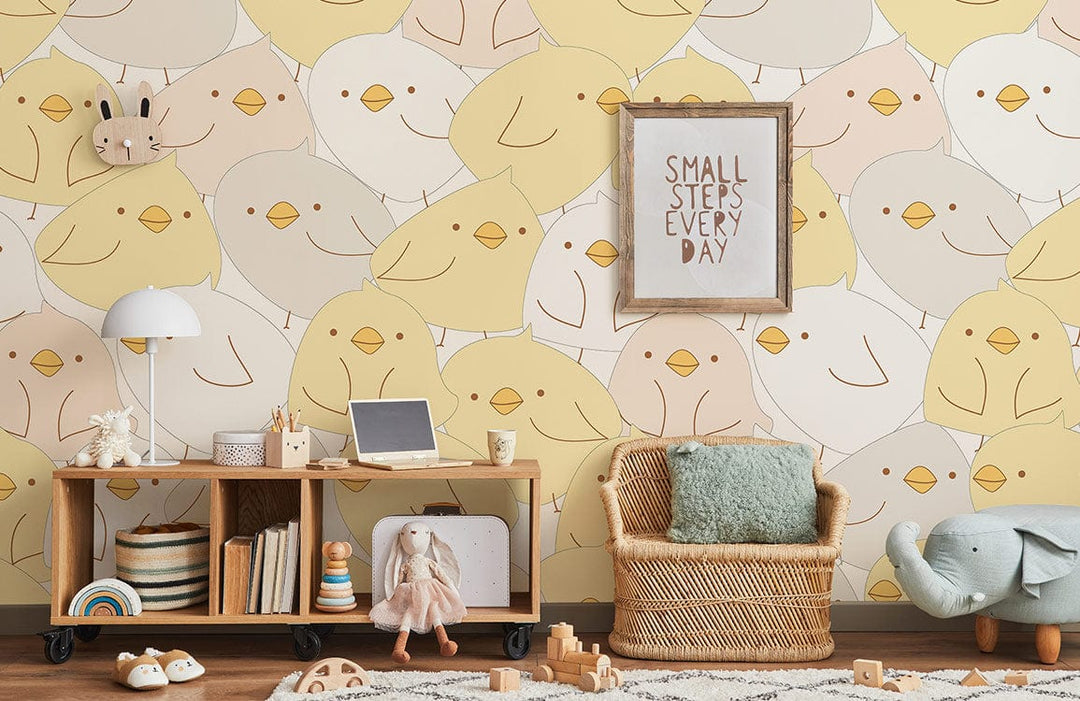 Charming Pastel Chick Pattern Wallpaper in nursery; wicker chair, wooden flooring, motivational framed art.