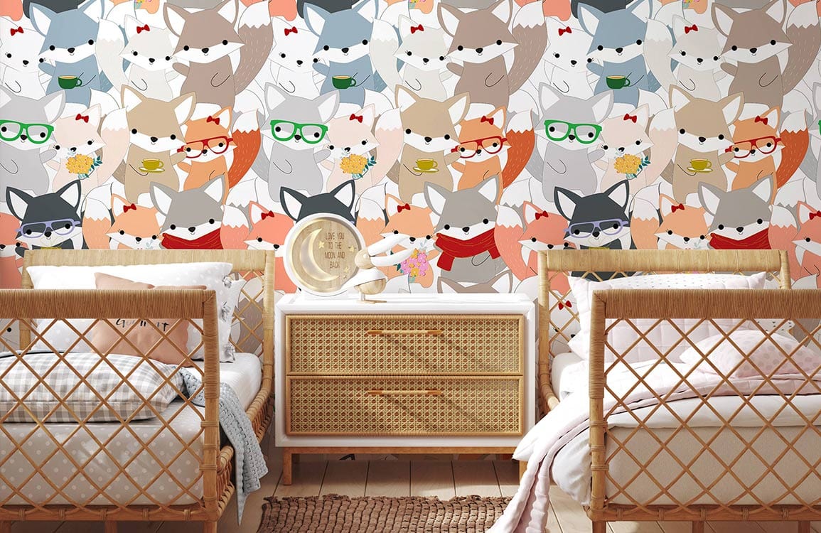 Whimsical woodland animals wallpaper in multicolour with natural rattan furniture in kids' bedroom nursery.