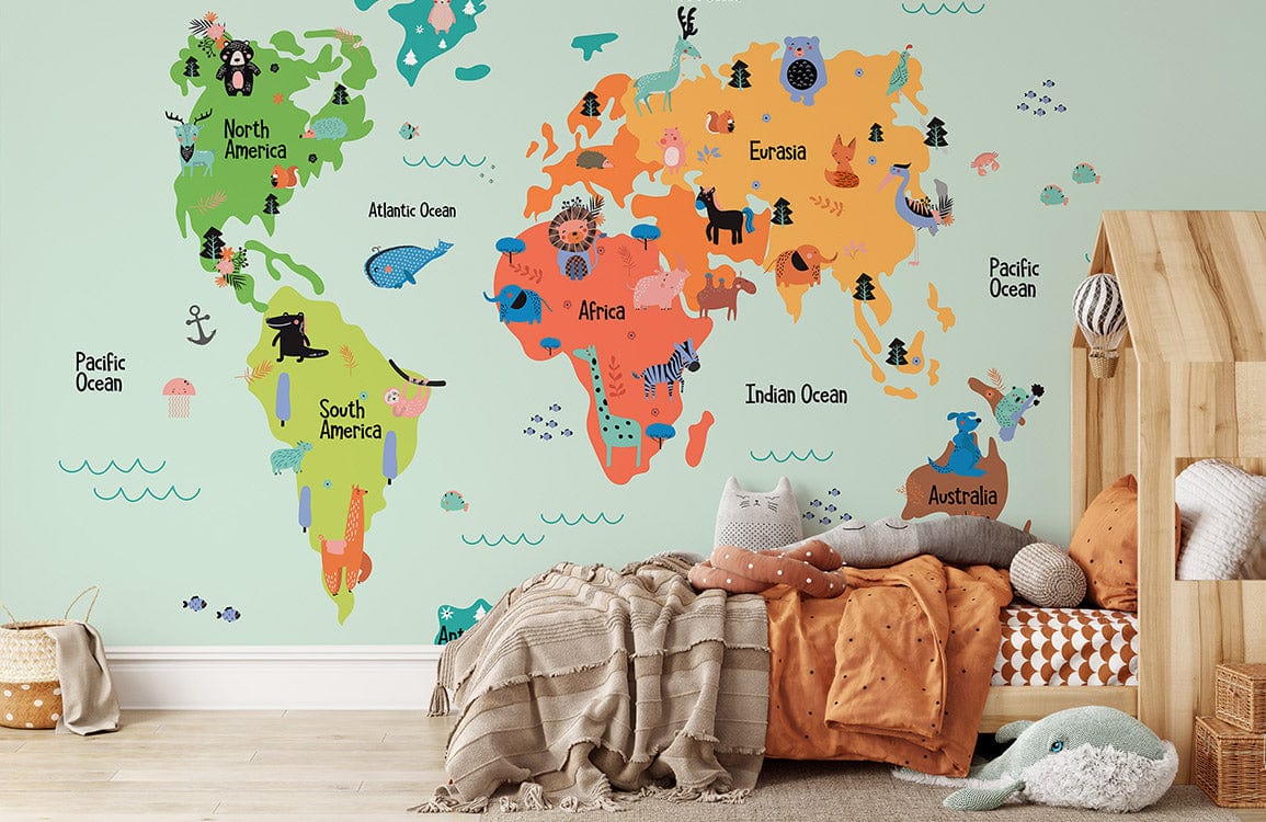 Colourful world map kids' wallpaper mural in playroom with cushions, light wood flooring, and toys.