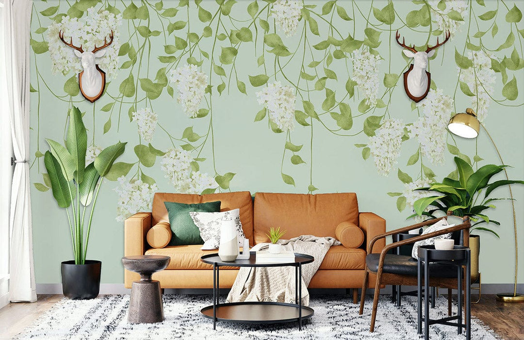 Elegant Green Floral Wallpaper with White Wisteria, tan sofa, round table in chic living room.