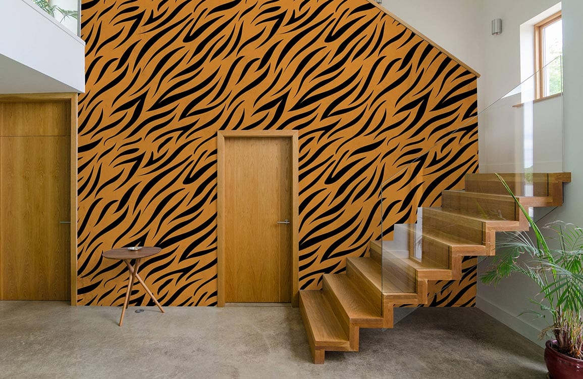 Exotic Tiger Print Wallpaper in orange and black with wooden staircase, modern hallway decor.