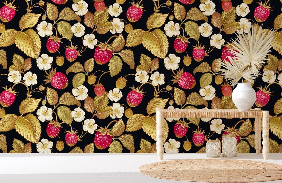 Vintage botanical strawberry wallpaper, gold leaves, black background, straw table, woven rug, white vase.