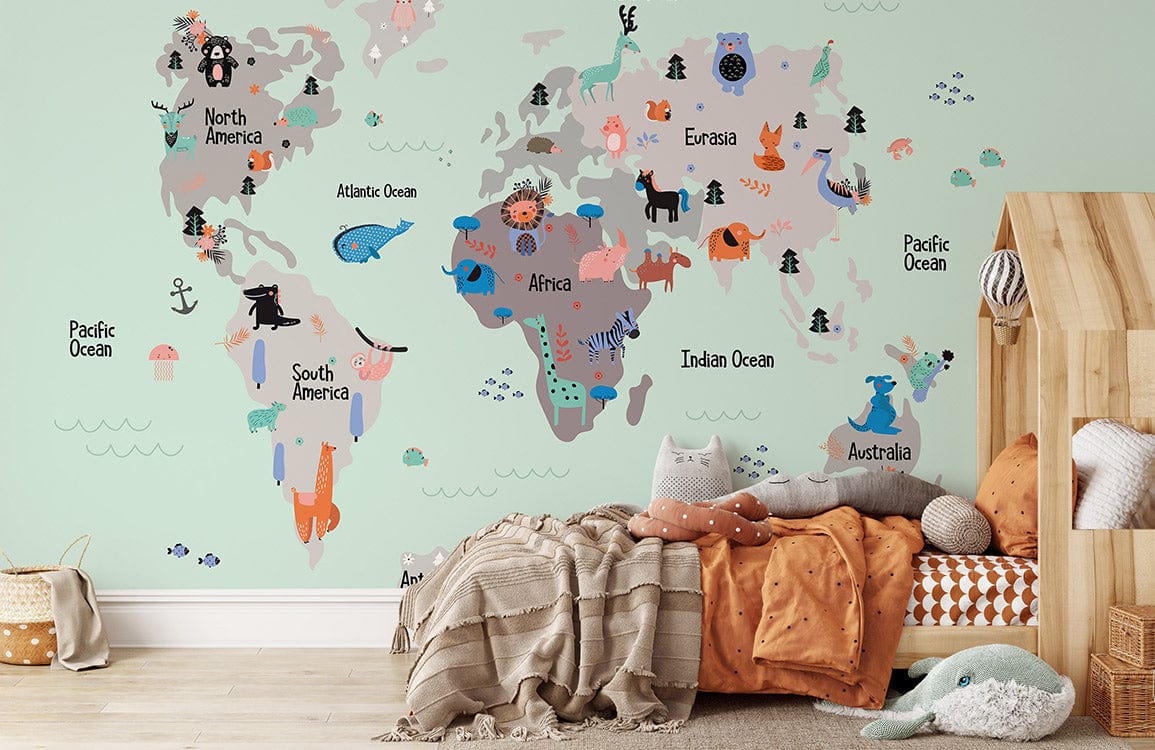 Playful Animal World Map Mural Wallpaper in kids' room with wooden furniture and cosy textiles.