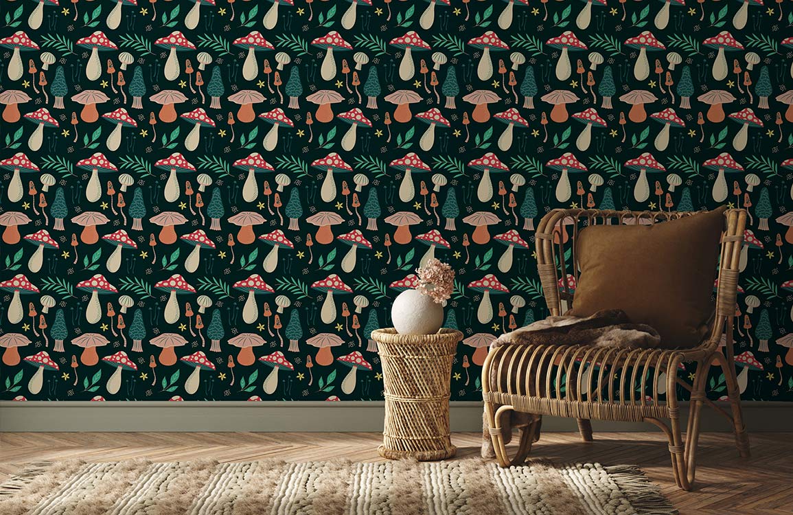 Enchanted Forest Mushroom Motif wallpaper in dark green with vintage chair, wicker basket, and rug.