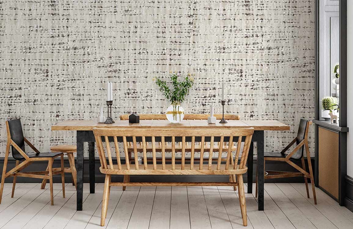 Textured beige and charcoal tweed wallpaper in dining room with wooden furniture and light flooring.