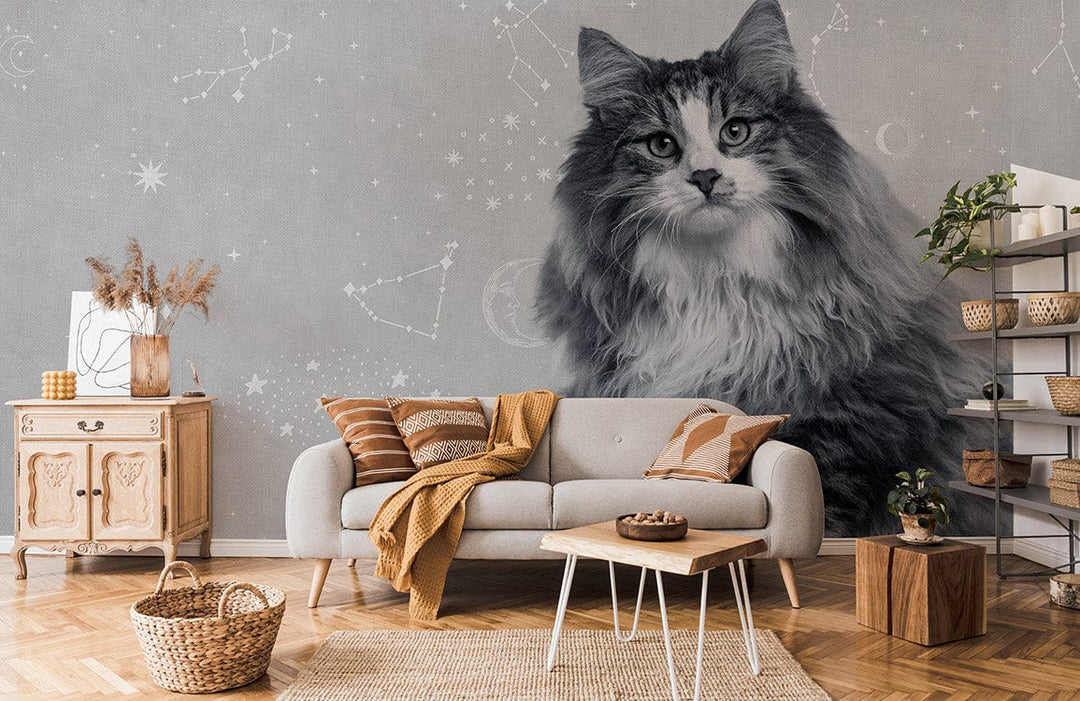 Grey wallpaper with celestial cat design in cosy living room, beige sofa, wooden furniture, herringbone flooring.