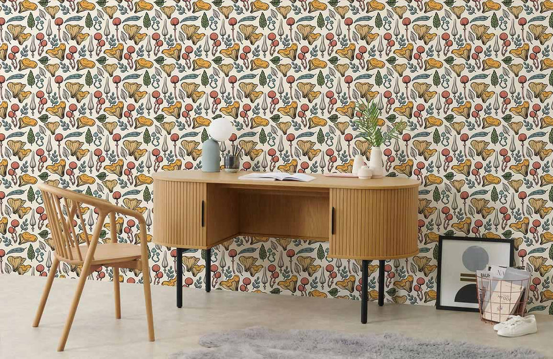 Vintage botanical wallpaper with earthy autumn colours, wooden desk and chair, light flooring, cosy rug.