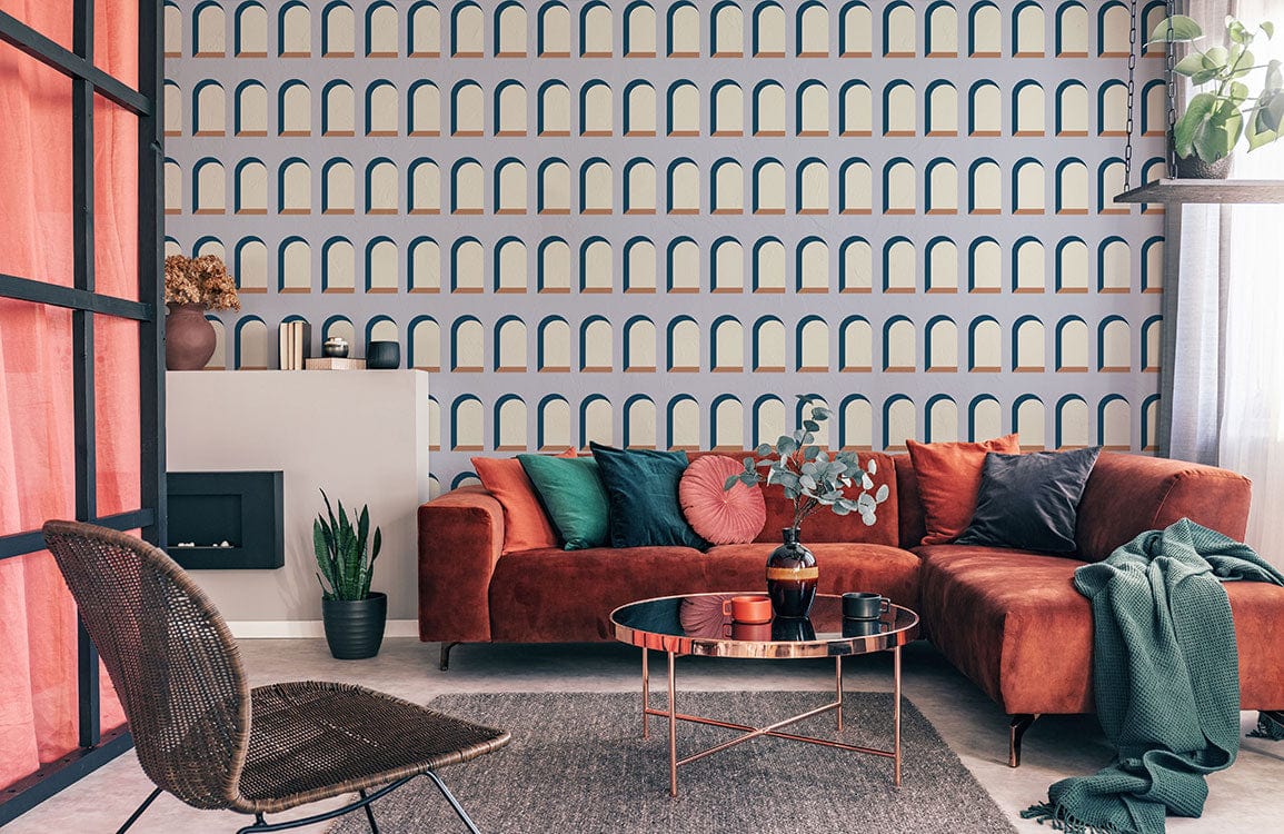 Blue and Cream Geometric Arched Wallpaper, modern living room, brown sofa, grey rug, metal coffee table.