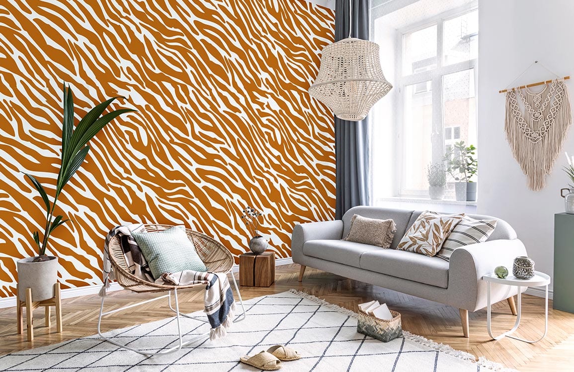 Elegant brown zebra print wallpaper in modern living room with grey sofa and wooden flooring.
