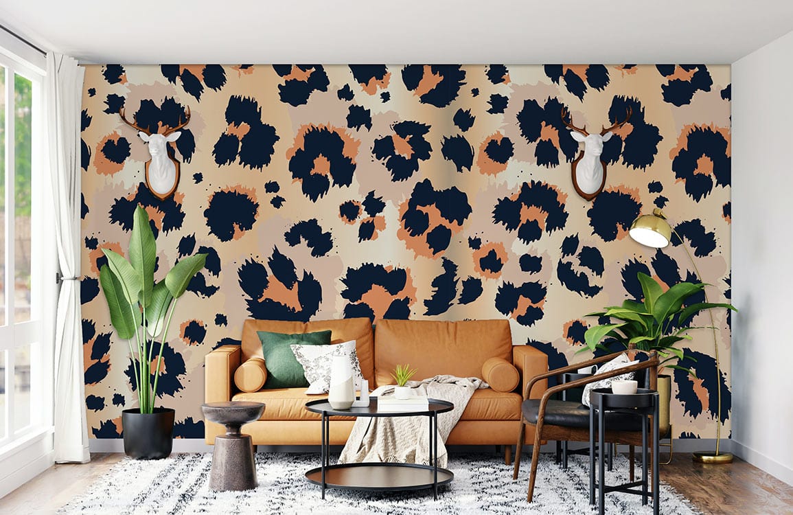 Exotic Leopard Print Wallpaper in living room with tan sofa, green cushions, and modern decor.