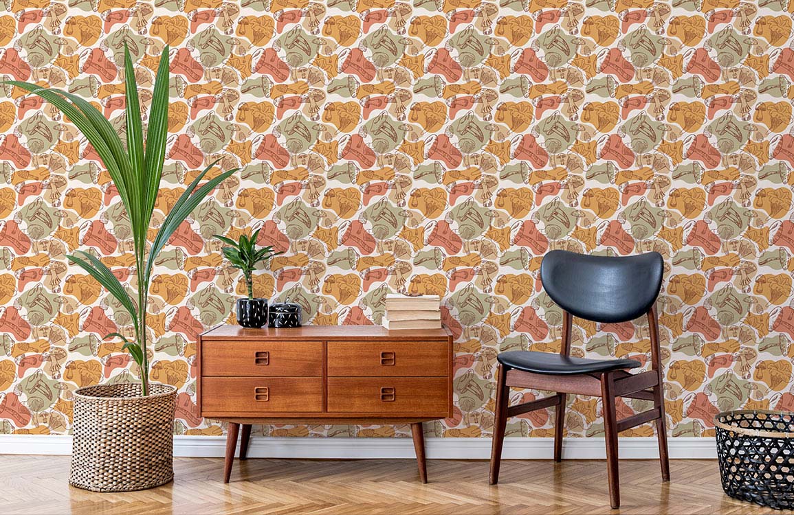Autumnal Leaf Motif Wallpaper, warm earthy tones, wooden cabinet, black chair, herringbone wood flooring.