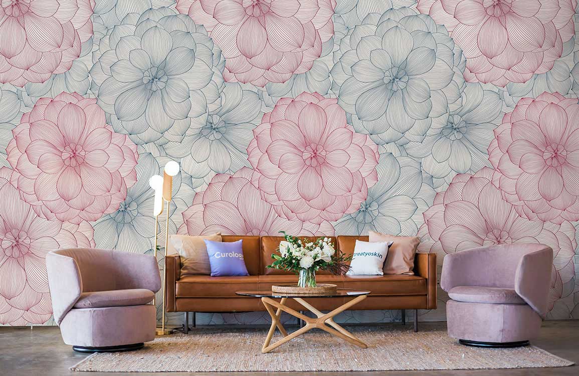 Pastel Floral Elegance Wallpaper with pink and blue blooms, paired with brown sofa and pink chairs.