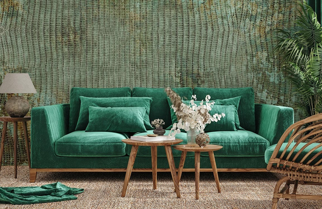 Elegant Rustic Teal and Brown Textured Wallpaper with teal velvet sofa, woven rug, and rattan chair.