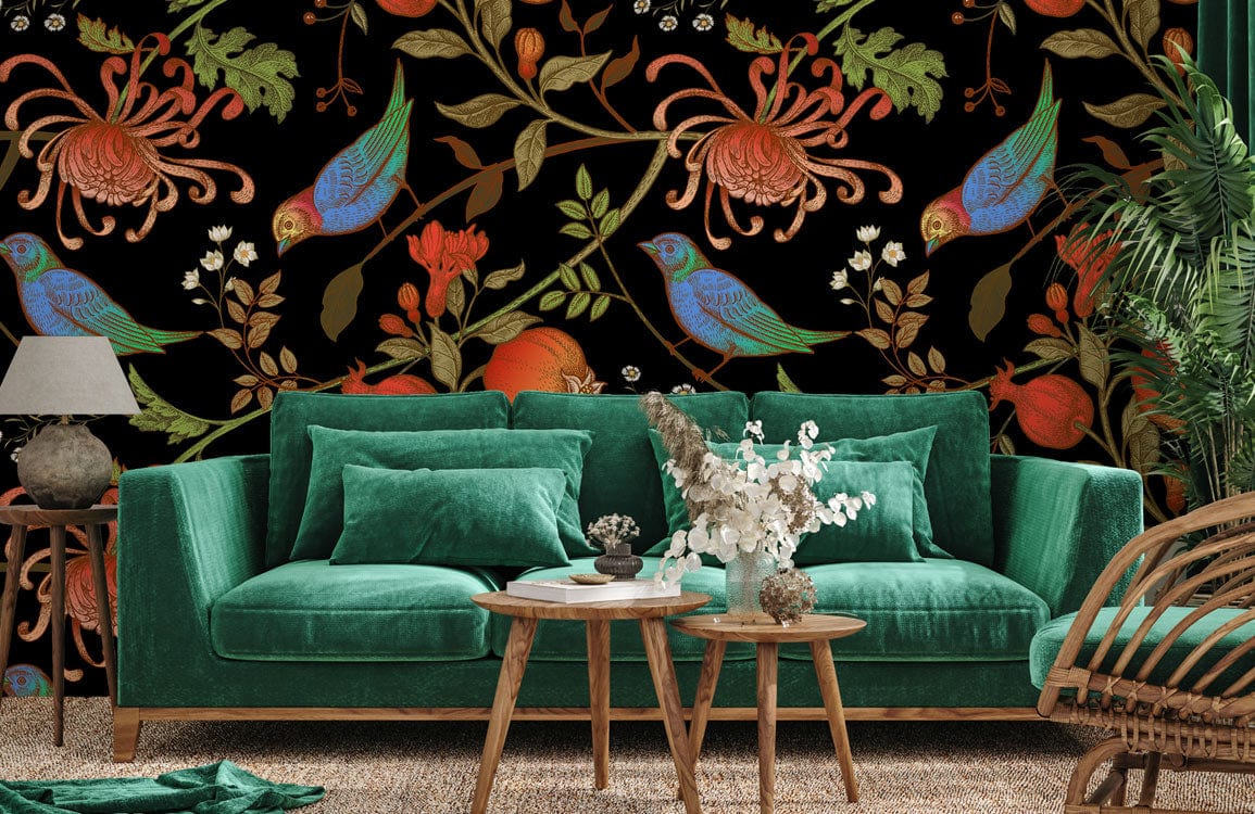 Vintage floral bird wallpaper, autumn hues; green velvet sofa, wooden tables; cosy living room.