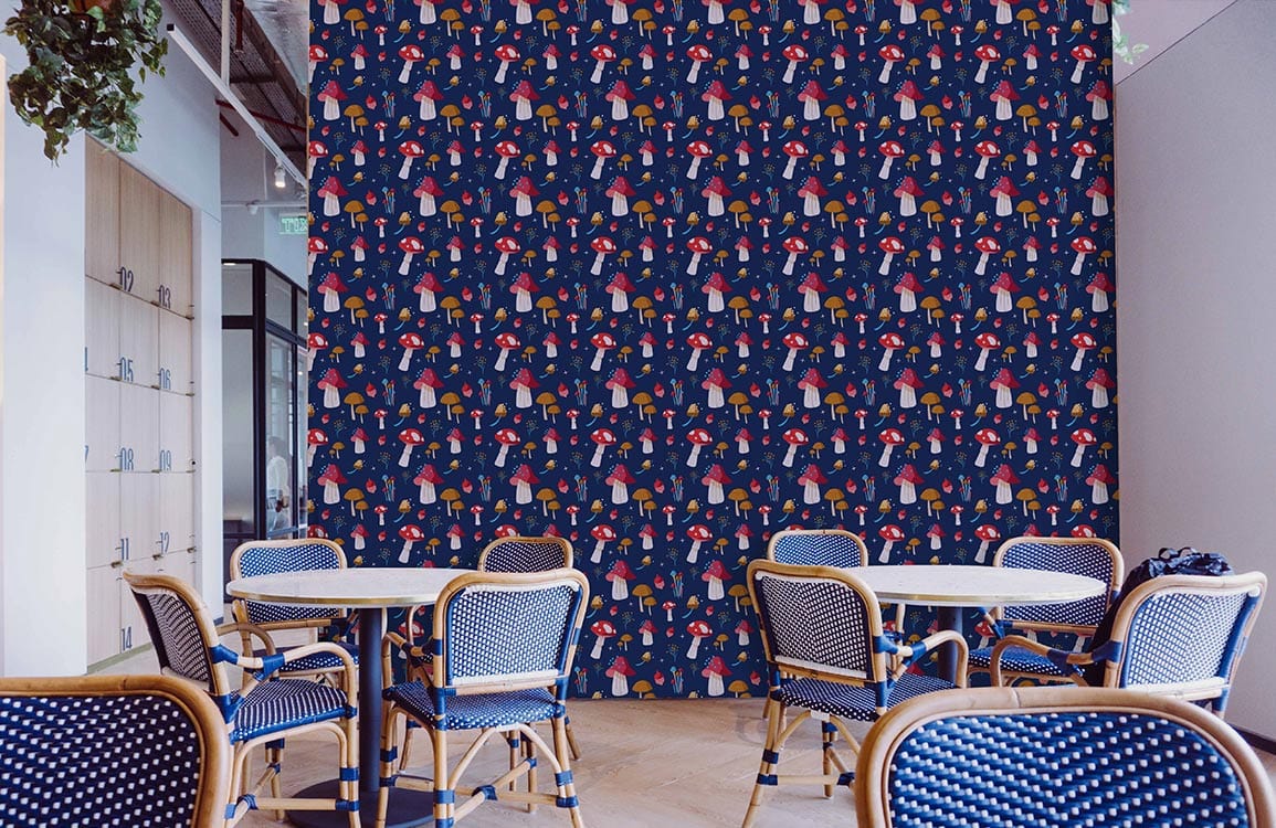 Whimsical Mushroom Wonderland Wallpaper in navy with multicolour design; dining chairs and tables visible.
