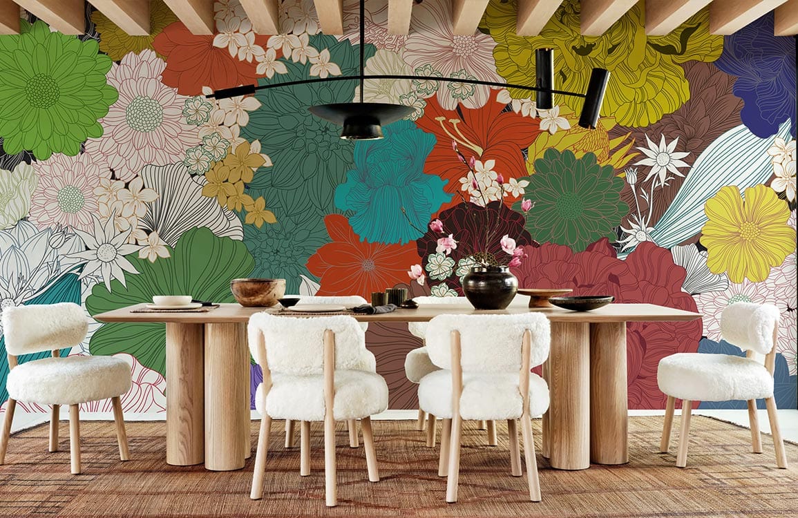 Vibrant multicolour floral wallpaper with wooden dining set and fluffy white chairs in modern dining room.