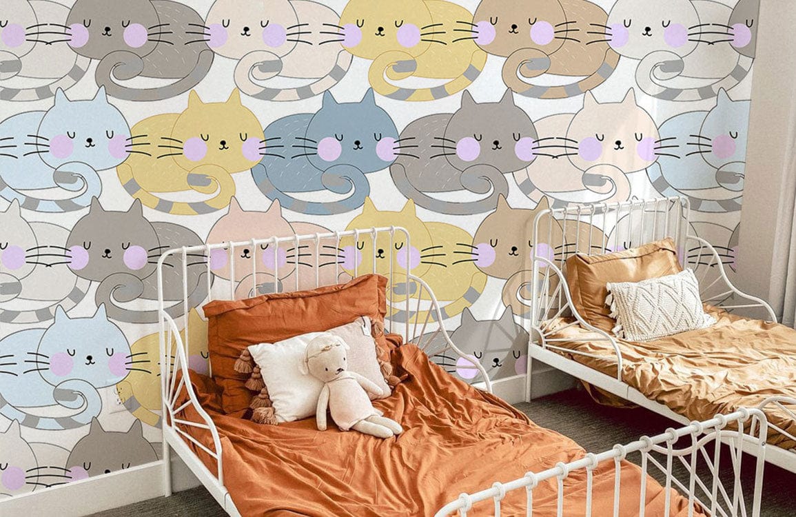 Pastel Whimsical Cat Pattern Wallpaper with white metal beds, orange bedding, neutral tones in children's room.