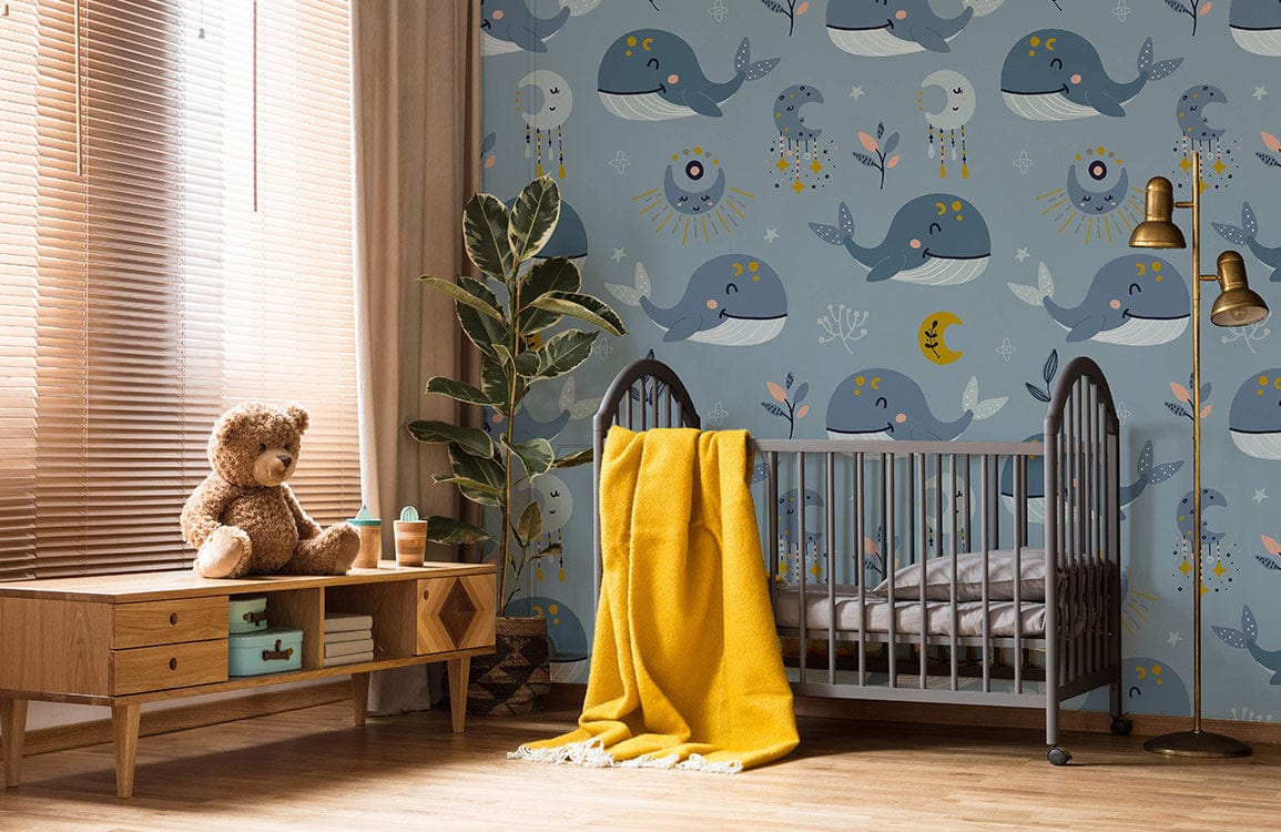 Whimsical Grey Whale Dreamcatcher wallpaper, children's room, wooden furniture, yellow blanket, cosy atmosphere.