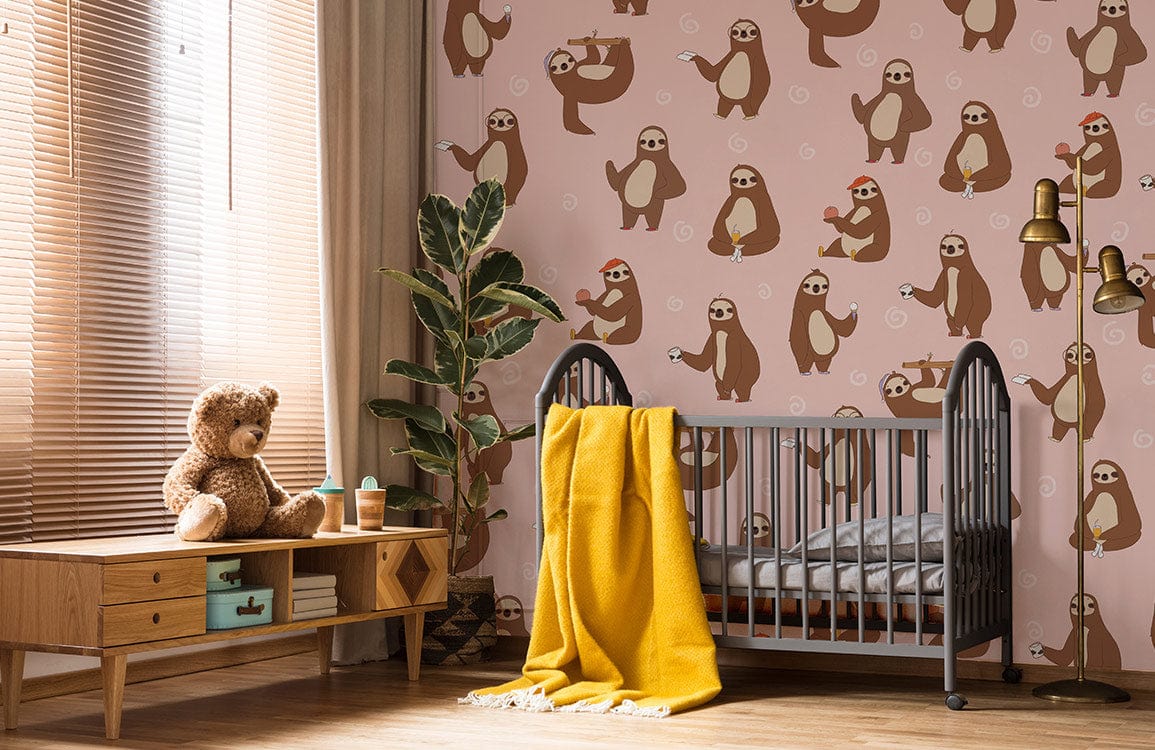 pink wallpaper mural with a sloth for nursery décor