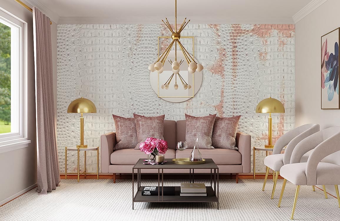 Elegant living room with textured crocodile-effect wallpaper, pink sofa, gold lamps, and modern chandelier.