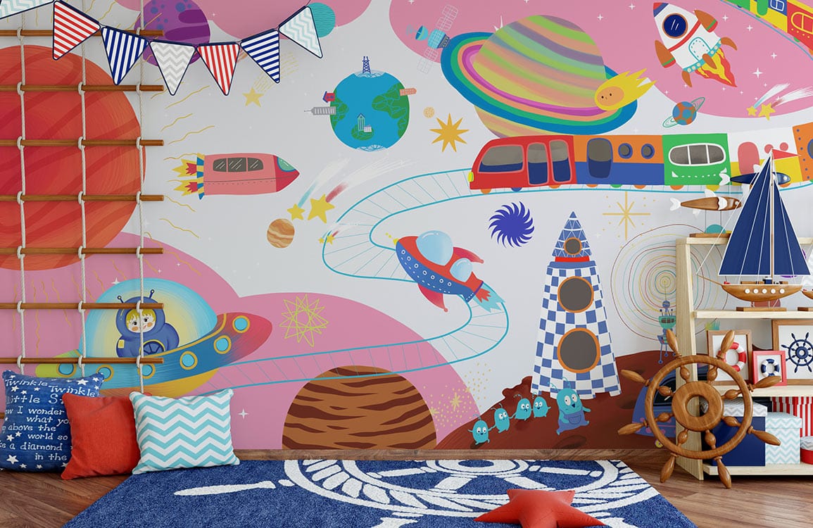 Pink children's room with space-themed wall mural, featuring planets and rocket ships, blue rug, nautical decor.