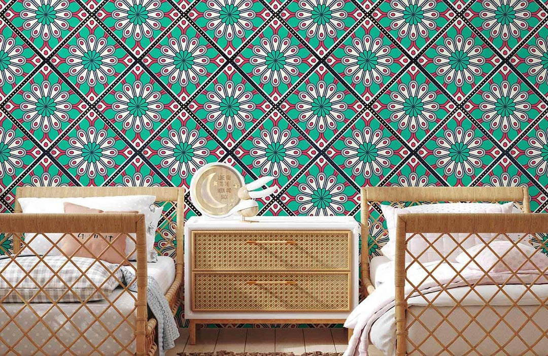 Turquoise and pink geometric floral wallpaper in retro chic design, wooden twin beds, wicker dresser.