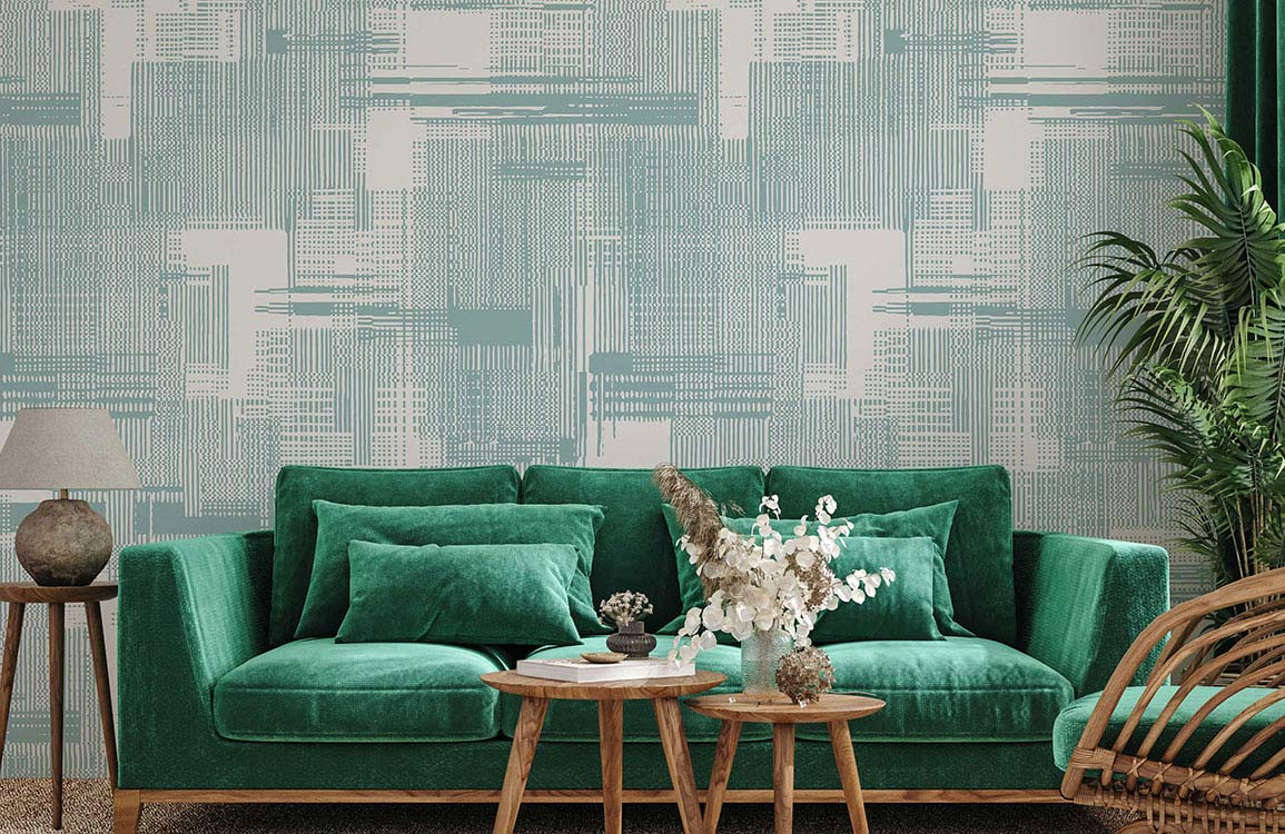 Mint geometric abstract wallpaper, modern green velvet sofa, wooden flooring, stylish living room interior.