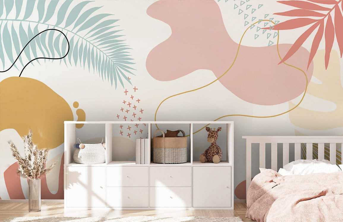 Tropical botanical pastel wallpaper in peach and sage tones, kids' room, white furniture, wooden flooring.