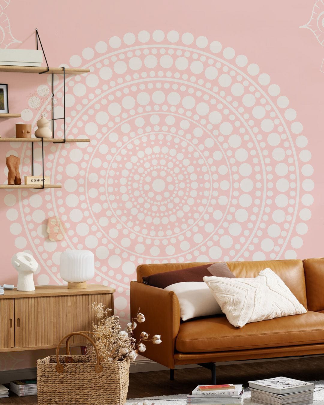Elegant pink and white mandala wallpaper in living room with brown sofa and wooden cabinet.