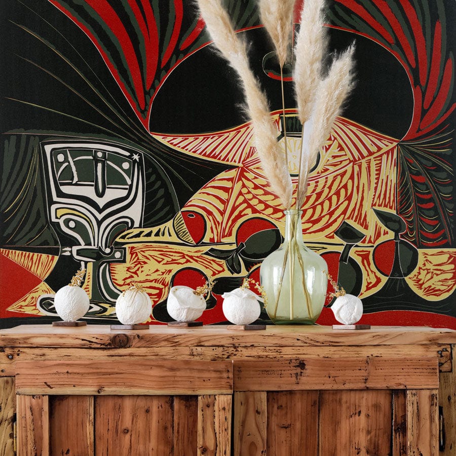 Abstract Red and Black Artistic Wallpaper behind rustic wooden cabinet with decorative vases in a living room.
