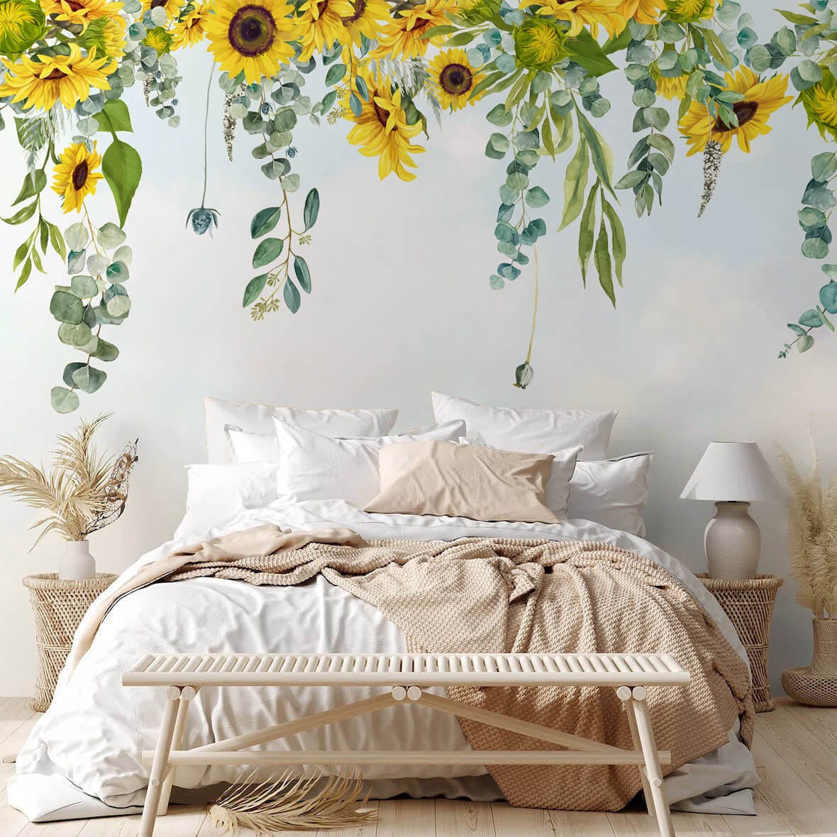 Sunny Floral Bliss Wallpaper in bedroom, featuring sunflowers and green decor, with white bedding and lamp.