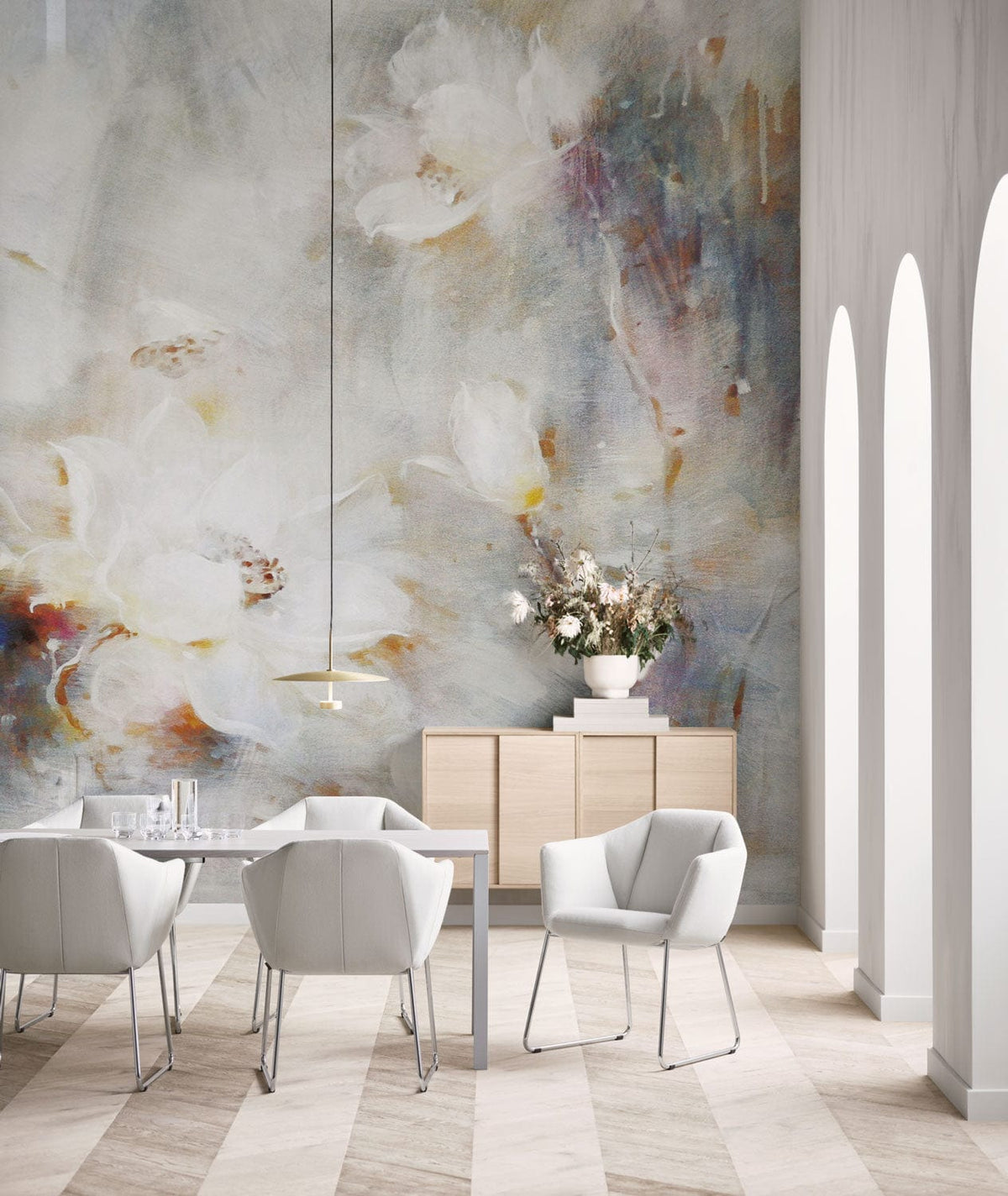 Ethereal Floral Mural Wallpaper in dining room with white chairs, light wood flooring, and arches.