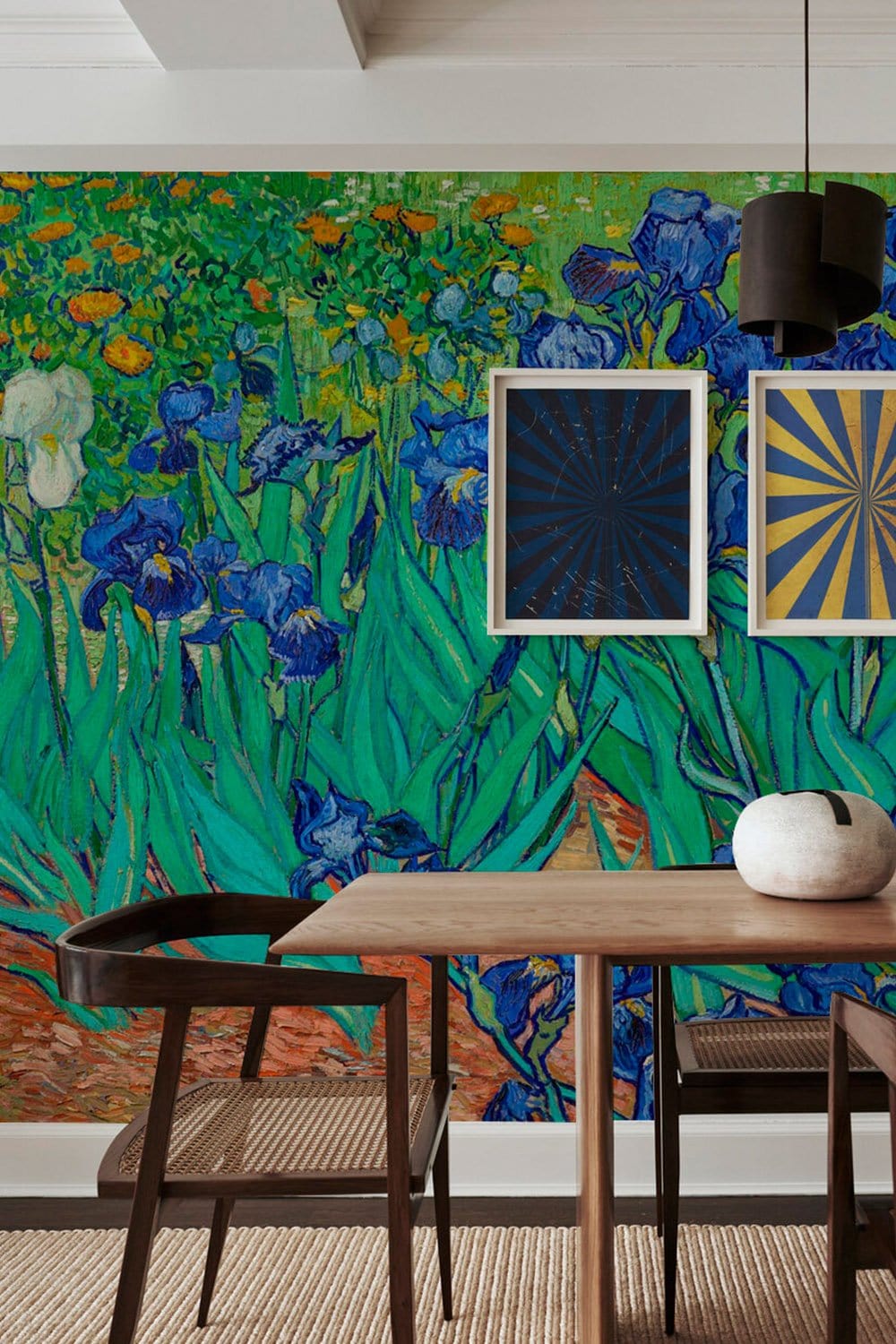 Dining room with Vibrant Blue Irises Floral Garden Mural Wallpaper, modern wooden table, black chairs.