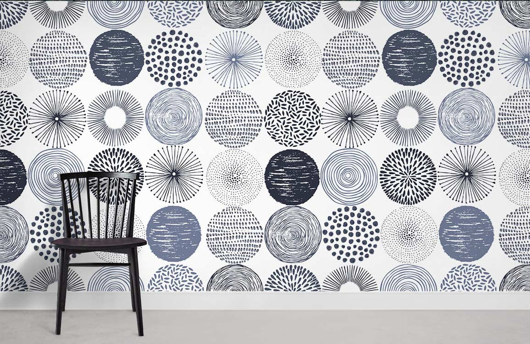 Monochrome geometric circles wallpaper featured with black chair, suitable for modern interior design.