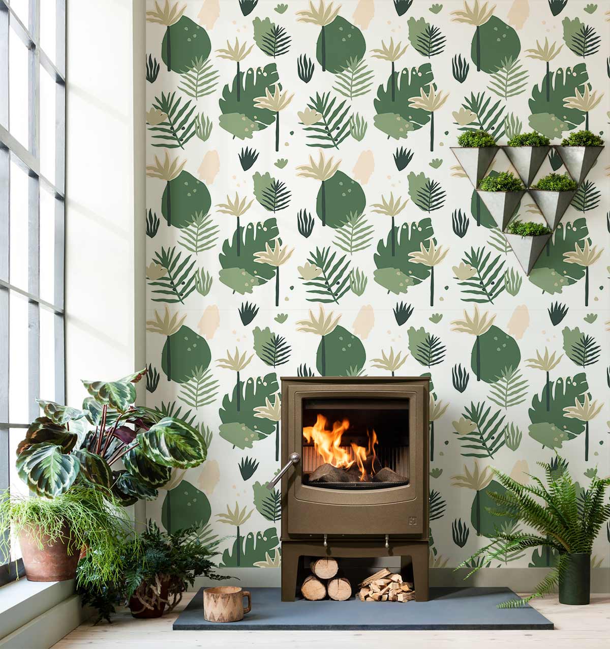 Botanical Green Leaf Pattern Wallpaper in tropical modern design with stove, wooden flooring, and windows.