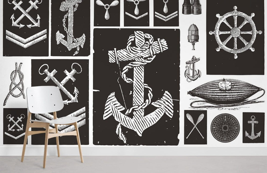 Vintage nautical anchor mural wallpaper in black and white with modern chair on grey flooring.