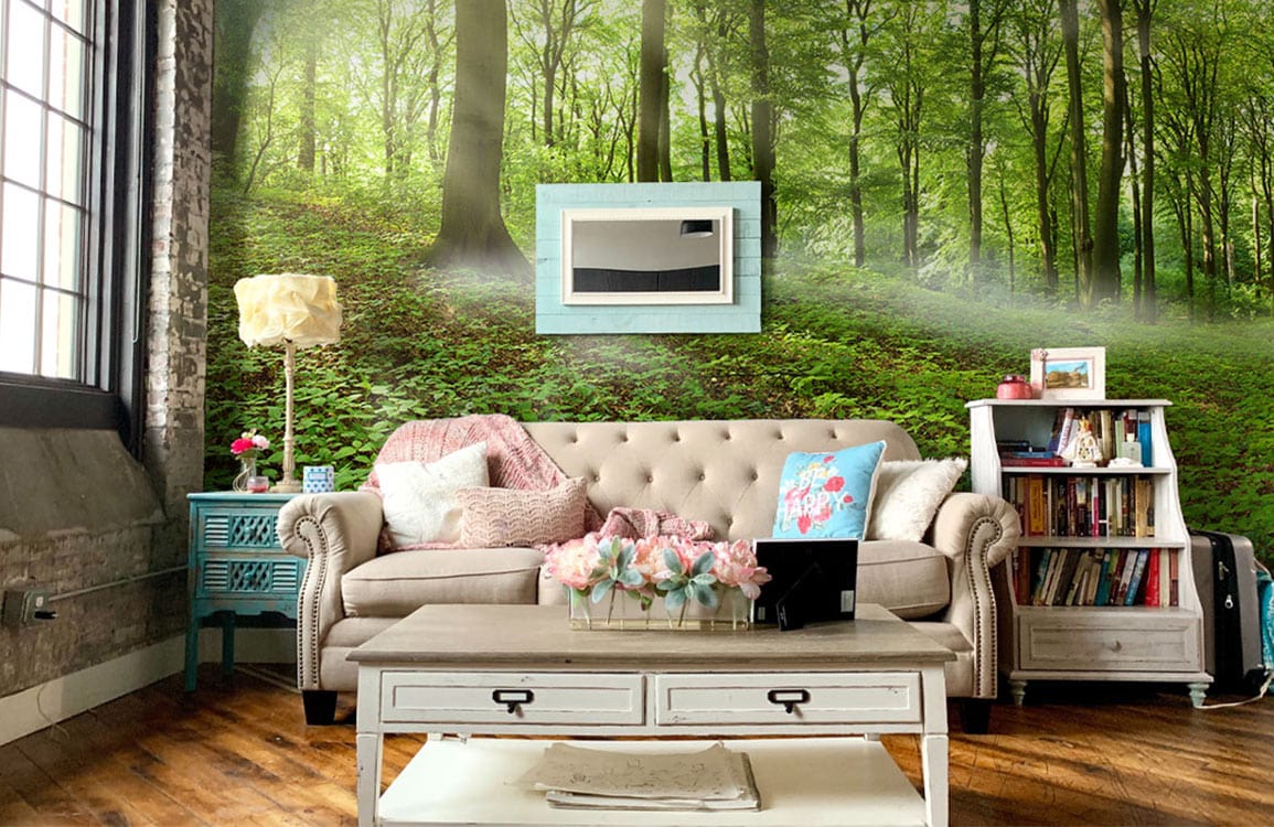 Tranquil Forest Green mural wallpaper in cosy living room with beige sofa, hardwood flooring, and framed art.