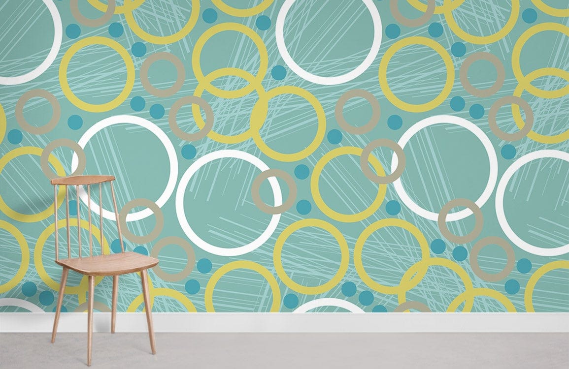Retro geometric teal yellow wallpaper; mid-century wooden chair; minimalist modern room decor style.