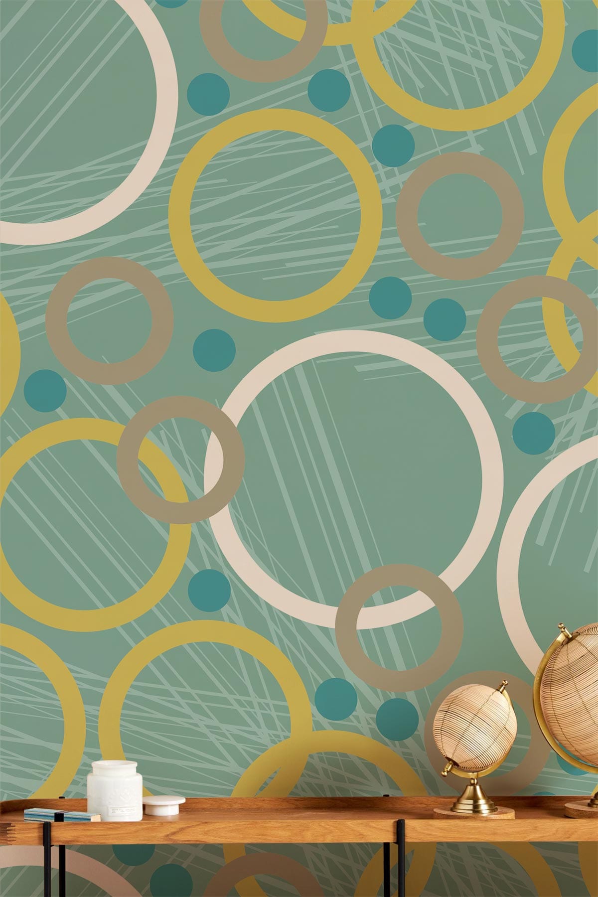 Retro Geometric Circles teal yellow wallpaper; wooden table, decorative globes; modern room design.