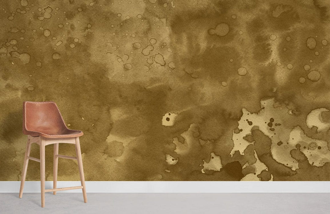 Vintage abstract mural wallpaper in earthy tones with brown leather chair on grey flooring in room.