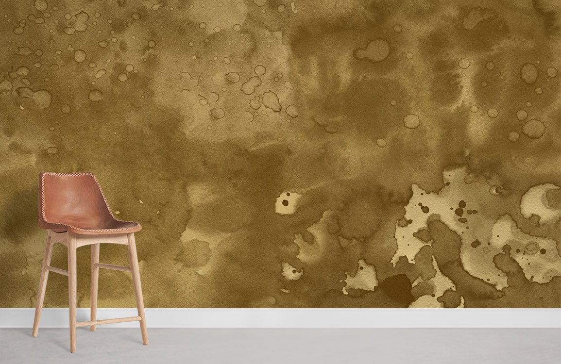 Vintage abstract mural wallpaper in earthy tones with brown leather chair on grey flooring in room.