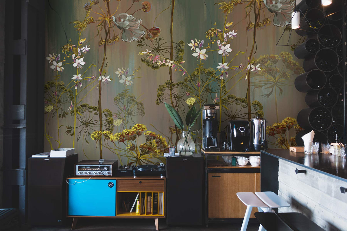 Vintage Botanical Floral Mural Wallpaper, rich green tones, rustic kitchen setting, modern black cabinets.