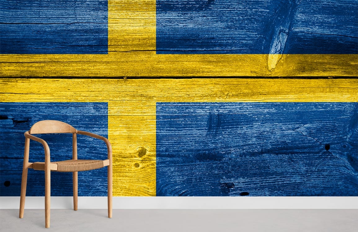 Swedish flag wallpaper mural with rustic woodgrain; features wooden chair, minimalistic decor.
