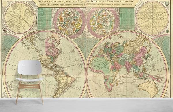 Alt text: Vintage world map mural wallpaper, antique tones, mid-century white chair, grey flooring, wall art.