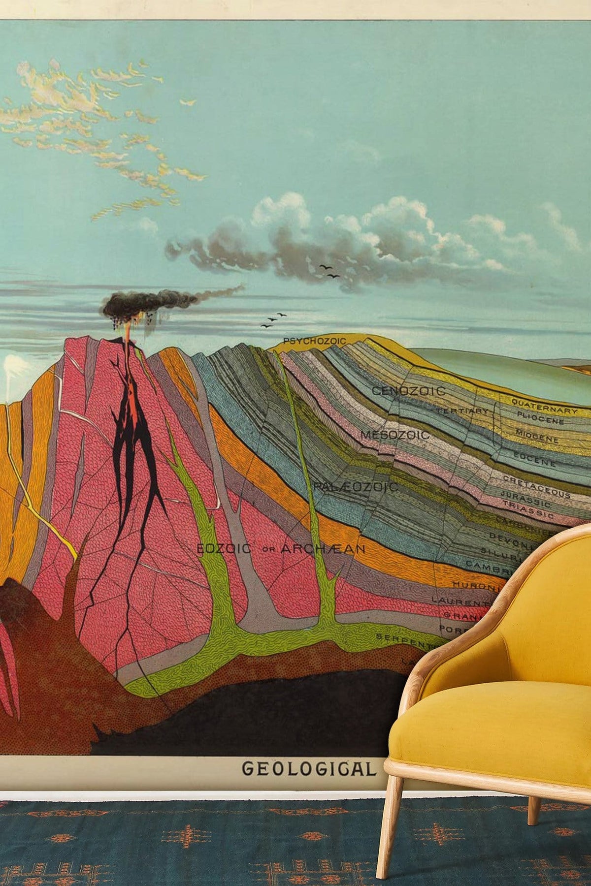 Colourful mural wallpaper with artistic geology design, featuring a yellow modern chair and textured flooring.